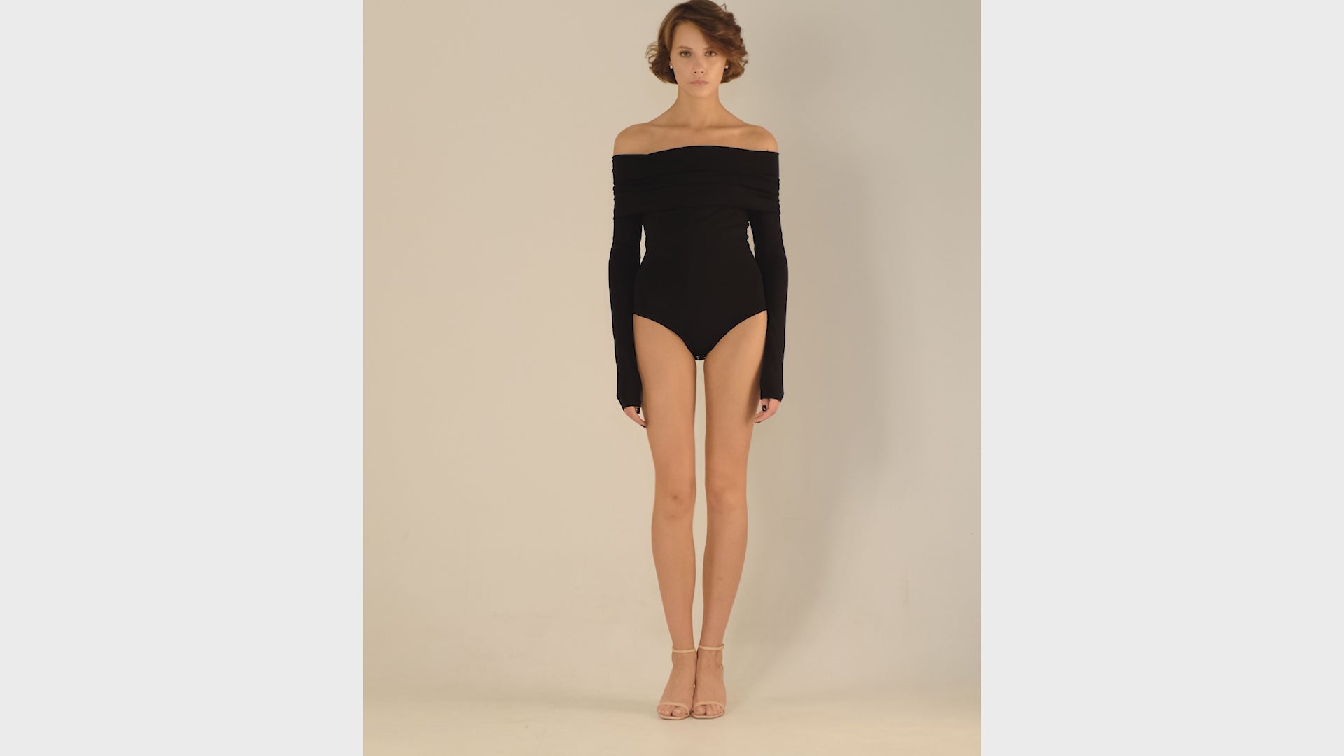 This bodysuit's model is for romantic character. The shoulder detail can be played with making it narrower or wider, or even covering your shoulders.