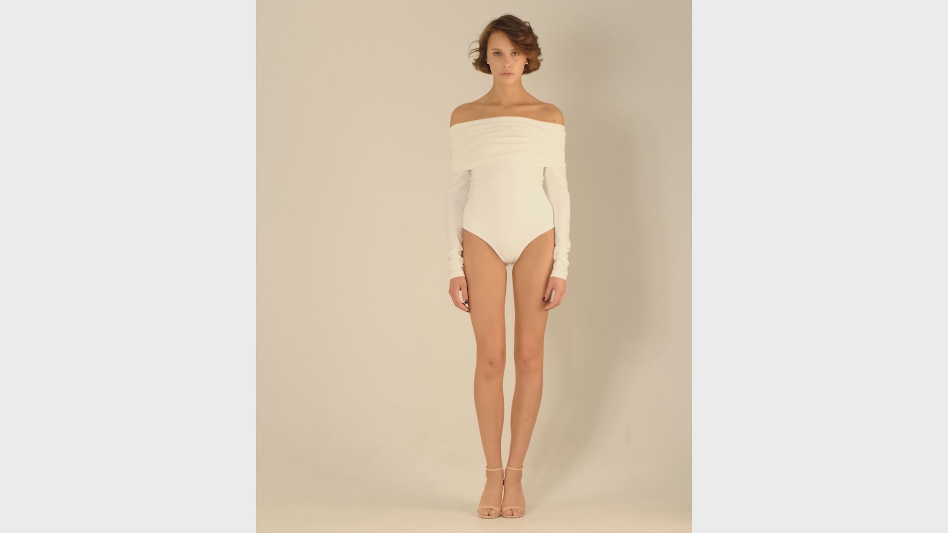 This bodysuit's model is for romantic character. The shoulder detail can be played with making it narrower or wider, or even covering your shoulders.