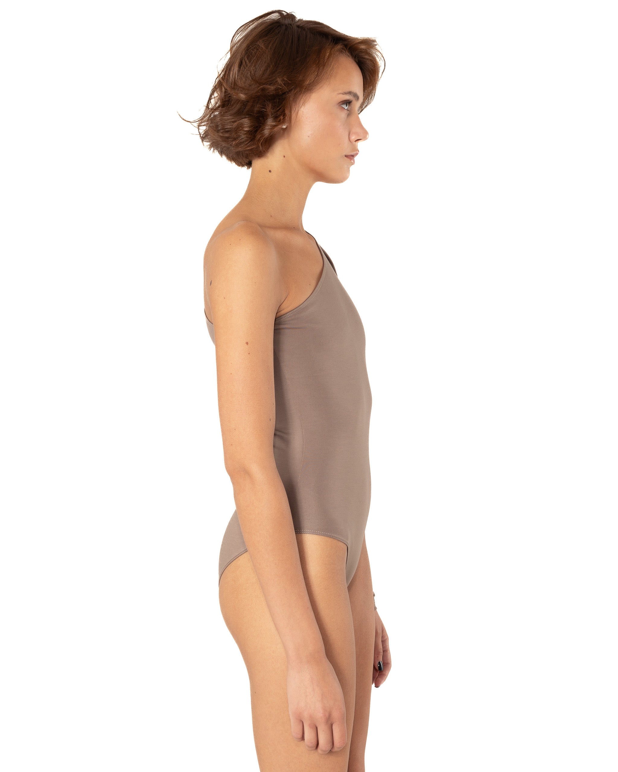 This bodysuit's model highlights the collarbone area and gracefully shows right shoulder and arm. The sleeve has wider body on the upper part which creates an elegant look.