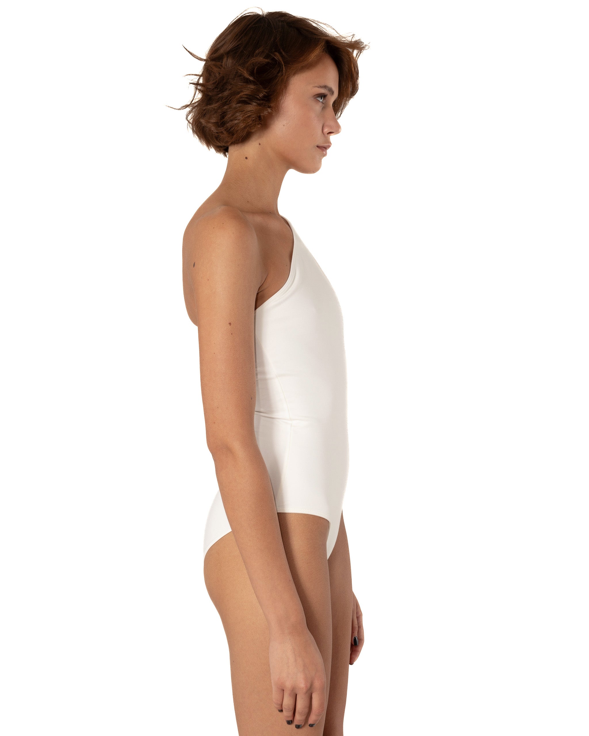This bodysuit's model beautifully highlights the collarbone area and shows shoulders. Light shirring on the shoulder creates very refined look.