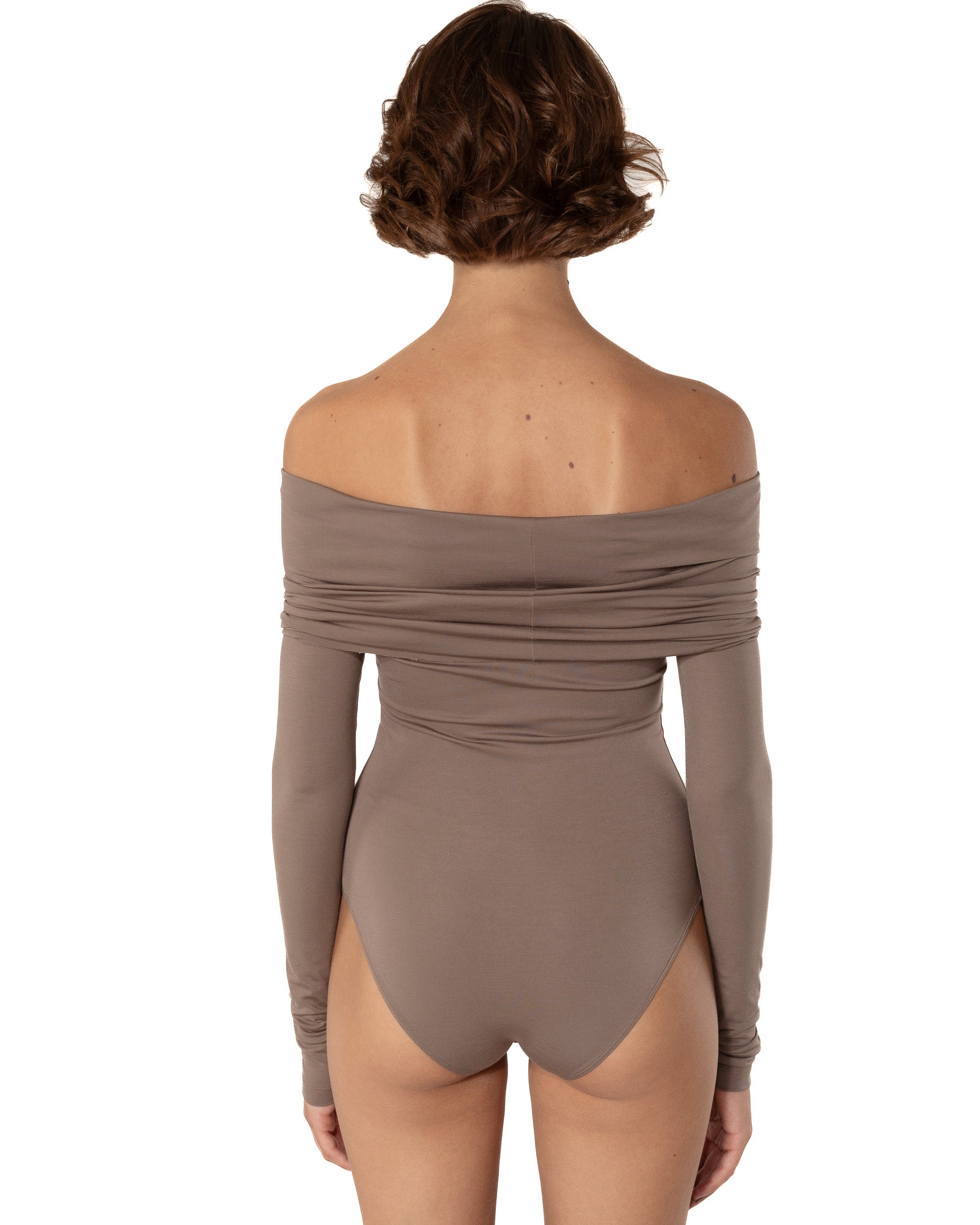 This bodysuit's model is for romantic character. The shoulder detail can be played with making it narrower or wider, or even covering your shoulders.