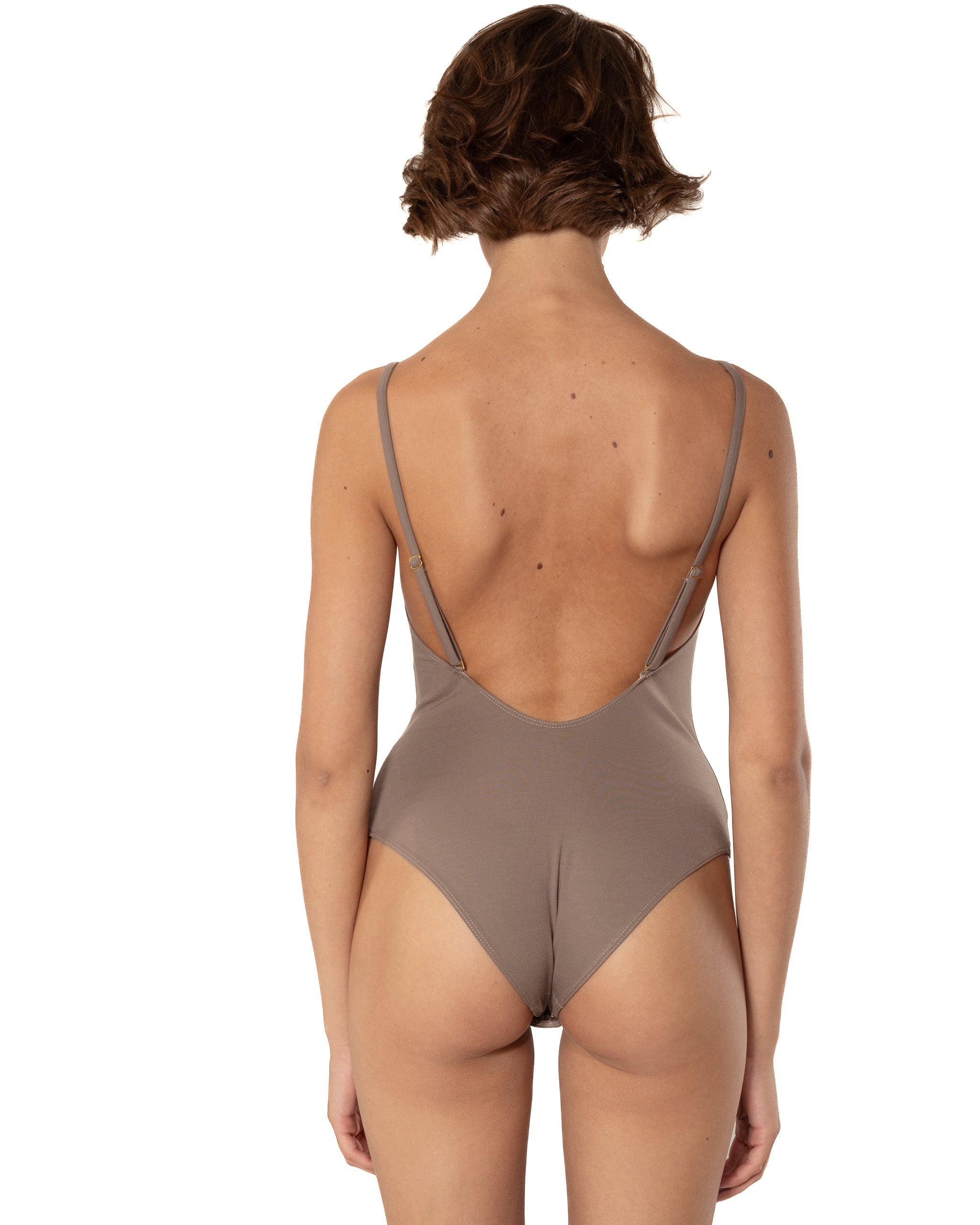 This bodysuit's model is designed for B+ cup. Perfect coverage in the front and super low cut on the back. Adjustable straps can be worn crossed on a back.