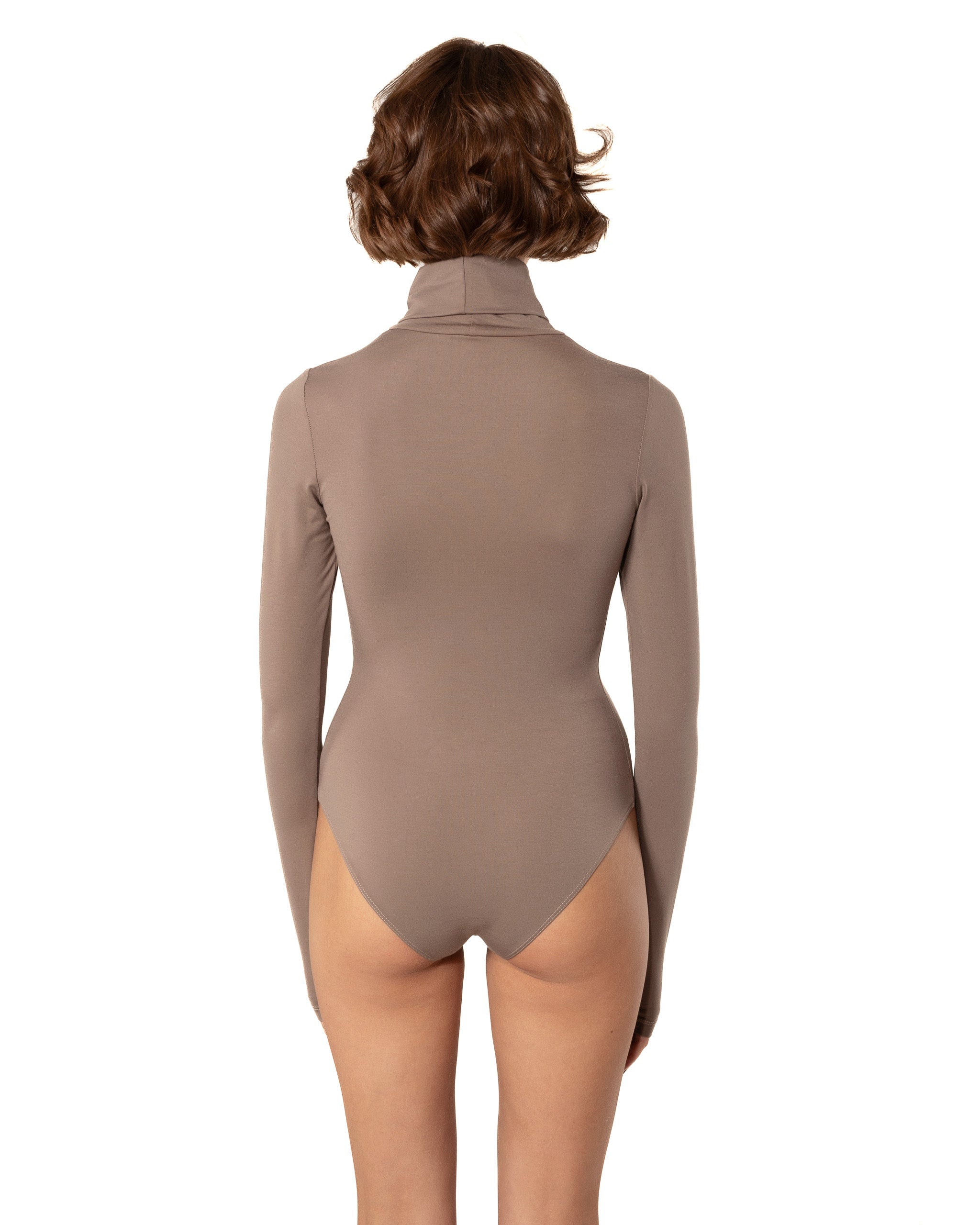 This bodysuit's model can be considered as your second skin. Long sleeve, hight turtle neck creates feeling of protection and comfort. Non-transparent fabric despite its elasticity makes it perfect for any occasion and activity.