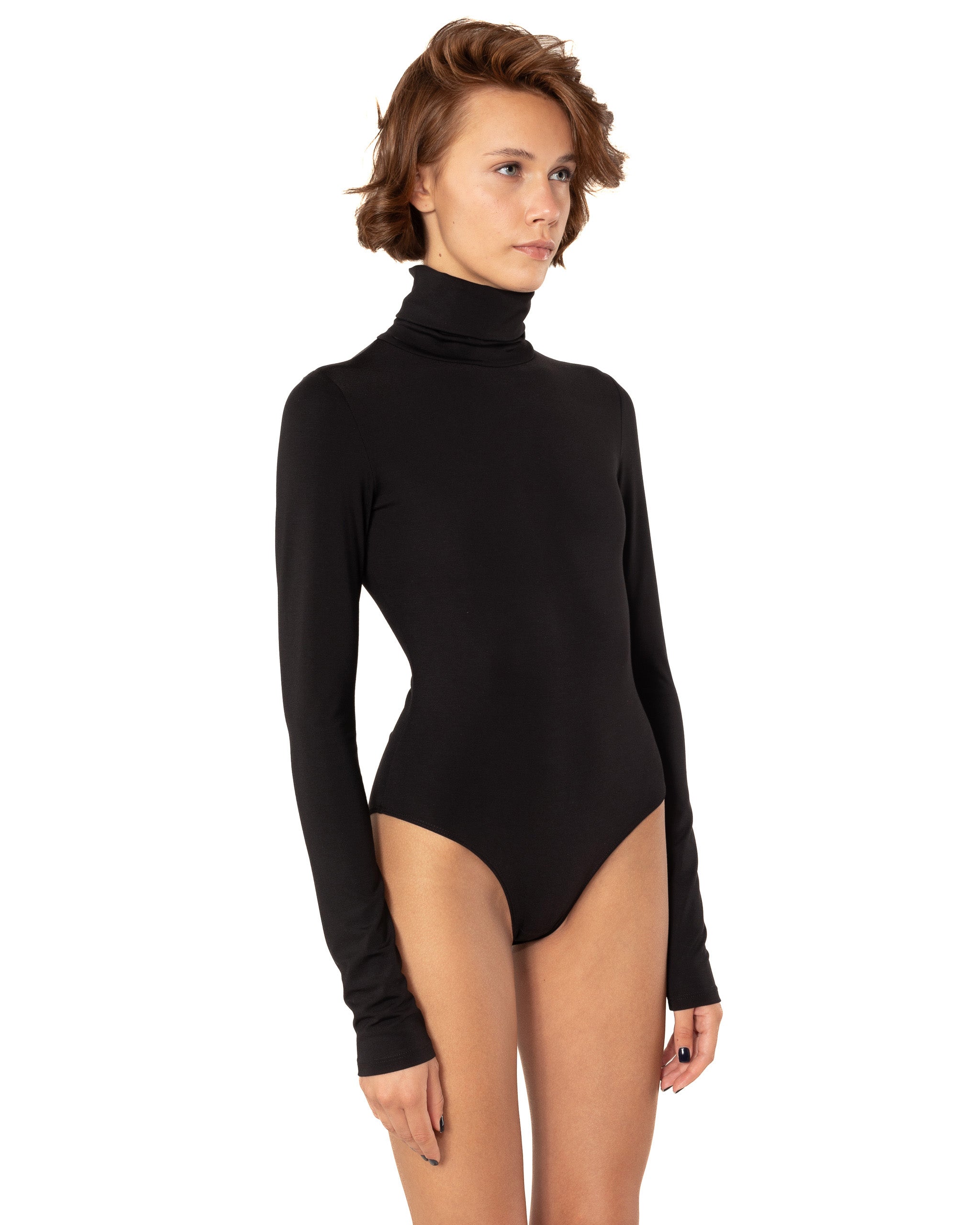 This bodysuit's model can be considered as your second skin. Long sleeve, hight turtle neck creates feeling of protection and comfort. Non-transparent fabric despite its elasticity makes it perfect for any occasion and activity.