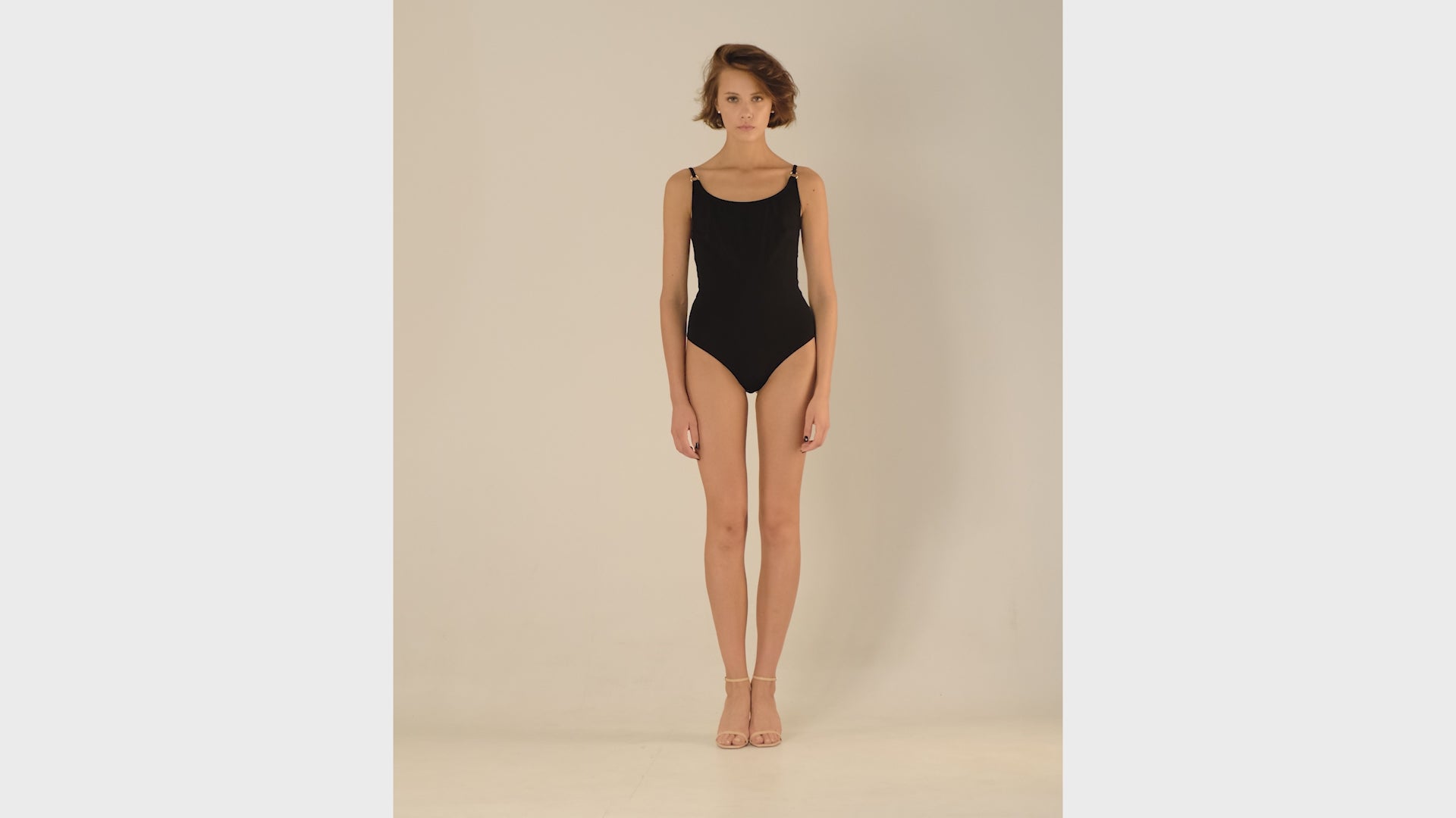 This bodysuit's model is designed for B+ cup. Perfect coverage in the front and super low cut on the back. Adjustable straps can be worn crossed on a back.