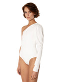 This bodysuit's model highlights the collarbone area and gracefully shows right shoulder and arm. The sleeve has wider body on the upper part which creates an elegant look.
