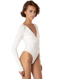 This bodysuit's model gives elegant sporty vibe. V-shape decollate and open back creates slightly provocative but very strong look.