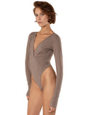 This bodysuit's model gives elegant sporty vibe. V-shape decollate and open back creates slightly provocative but very strong look.