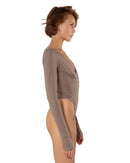 This bodysuit's model gives elegant sporty vibe. V-shape decollate and open back creates slightly provocative but very strong look.