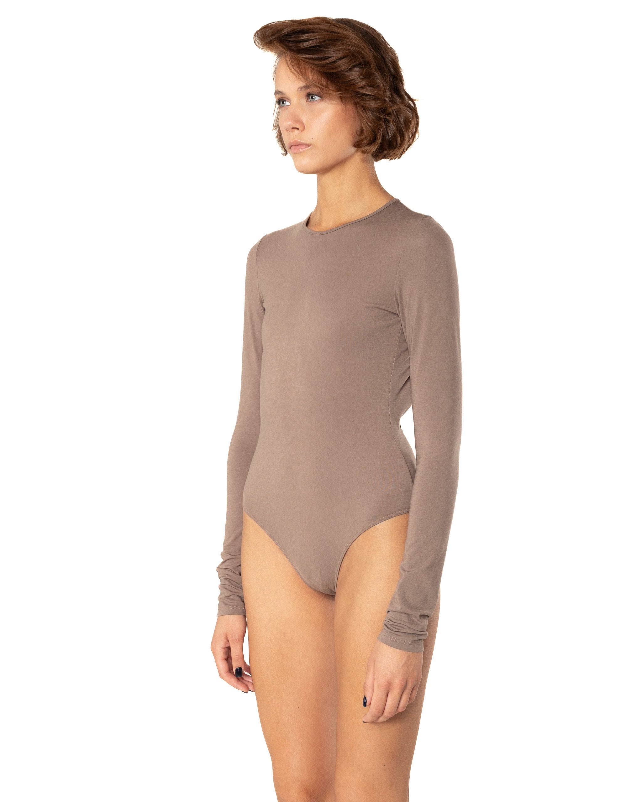 This bodysuit's model embraces femininity more than any piece of clothing possibly could. Non-transparent elastic fabric perfectly covers your body from the front and opens on the back flirtatiously.
